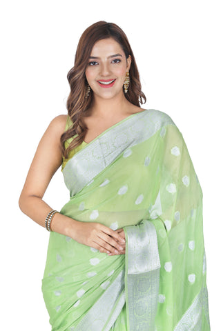 Classic Allure: Light Parrot Green Pure Khaddi Georgette Saree with Silver Border and Beautiful Pallu