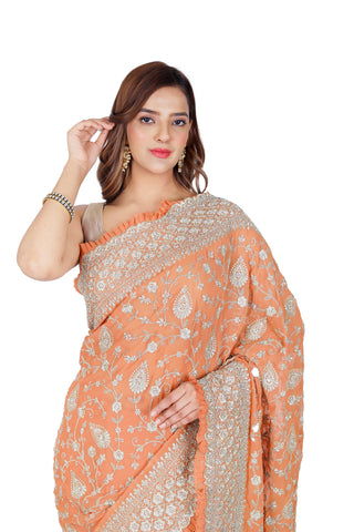 Designer Delight: Orange Georgette Saree with Exquisite Embroidery