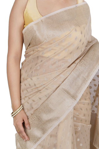 Classic Charm: Beige Banarasi Cotton Saree with Ornate Border