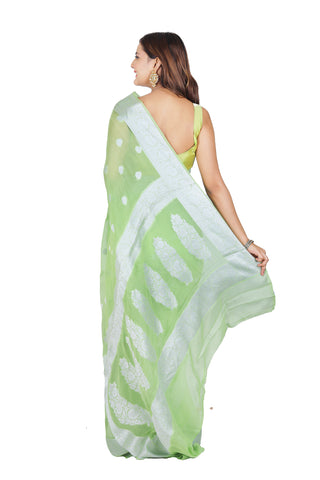 Classic Allure: Light Parrot Green Pure Khaddi Georgette Saree with Silver Border and Beautiful Pallu