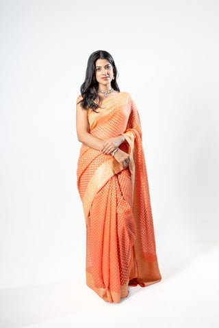 Pure Khaddi Georgette peach colour  handloom Saree with woven booty all over