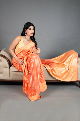 Pure Khaddi Georgette peach colour  handloom Saree with woven booty all over