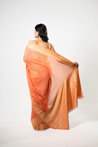 Pure Khaddi Georgette peach colour  handloom Saree with woven booty all over