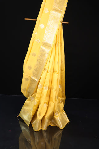 Golden Glow: Yellow Pure Chiniya Silk Saree with Radiant Elegance